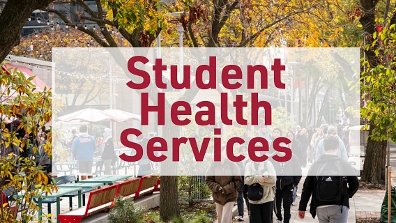 The image features the words "Student Health Services" overlaid on a busy outdoor scene with people walking amongst autumn trees and benches.